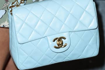 Why is the luxury handbag market increasing?