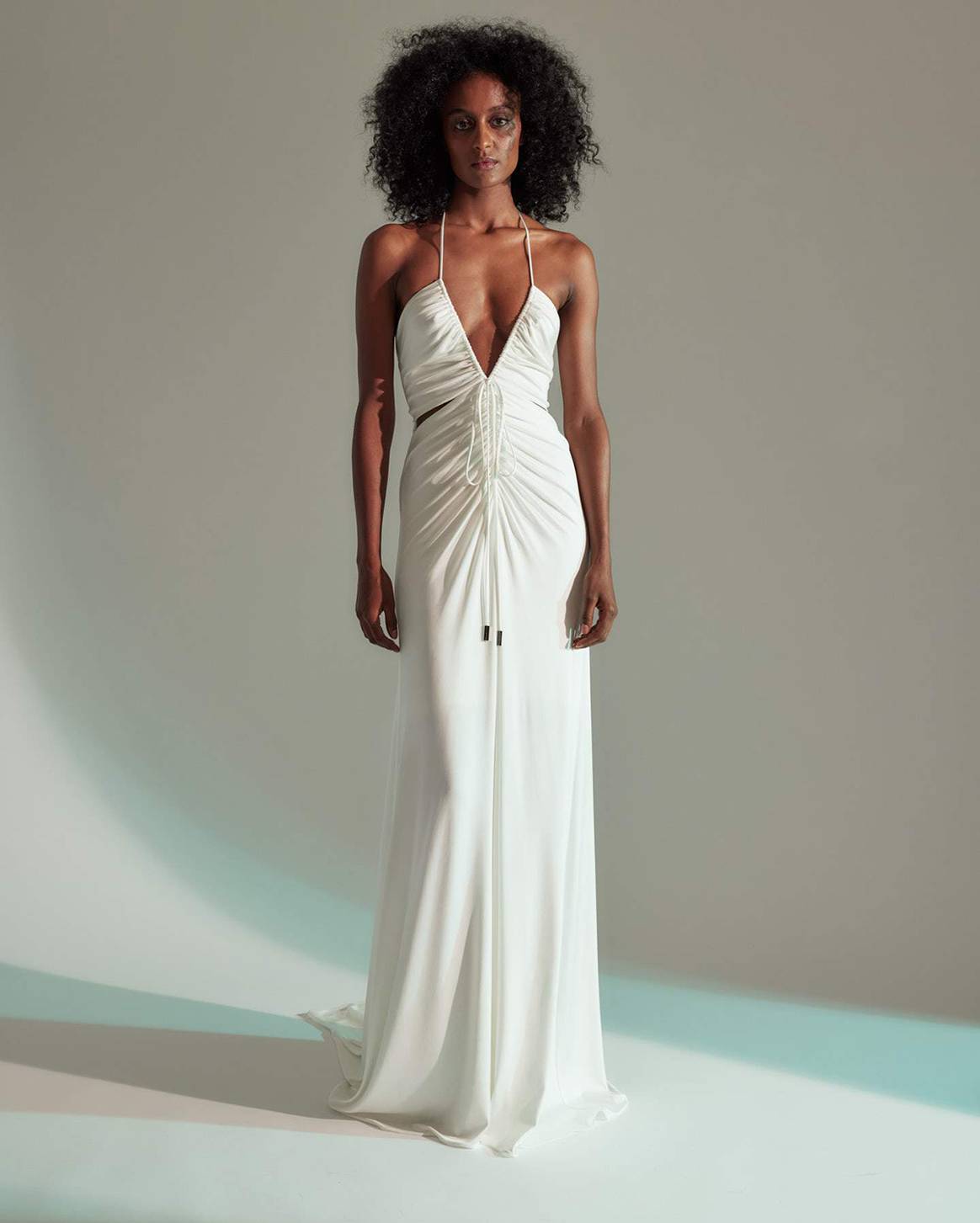 Photo Credits: “Grace” runched jersey gown. Halston x Netflix.