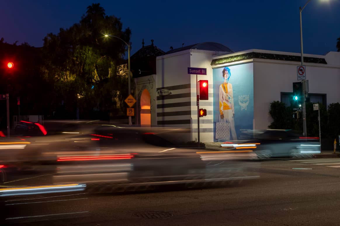 MCM advertising in form of hand painted mural on Sunset Boulevard, LA