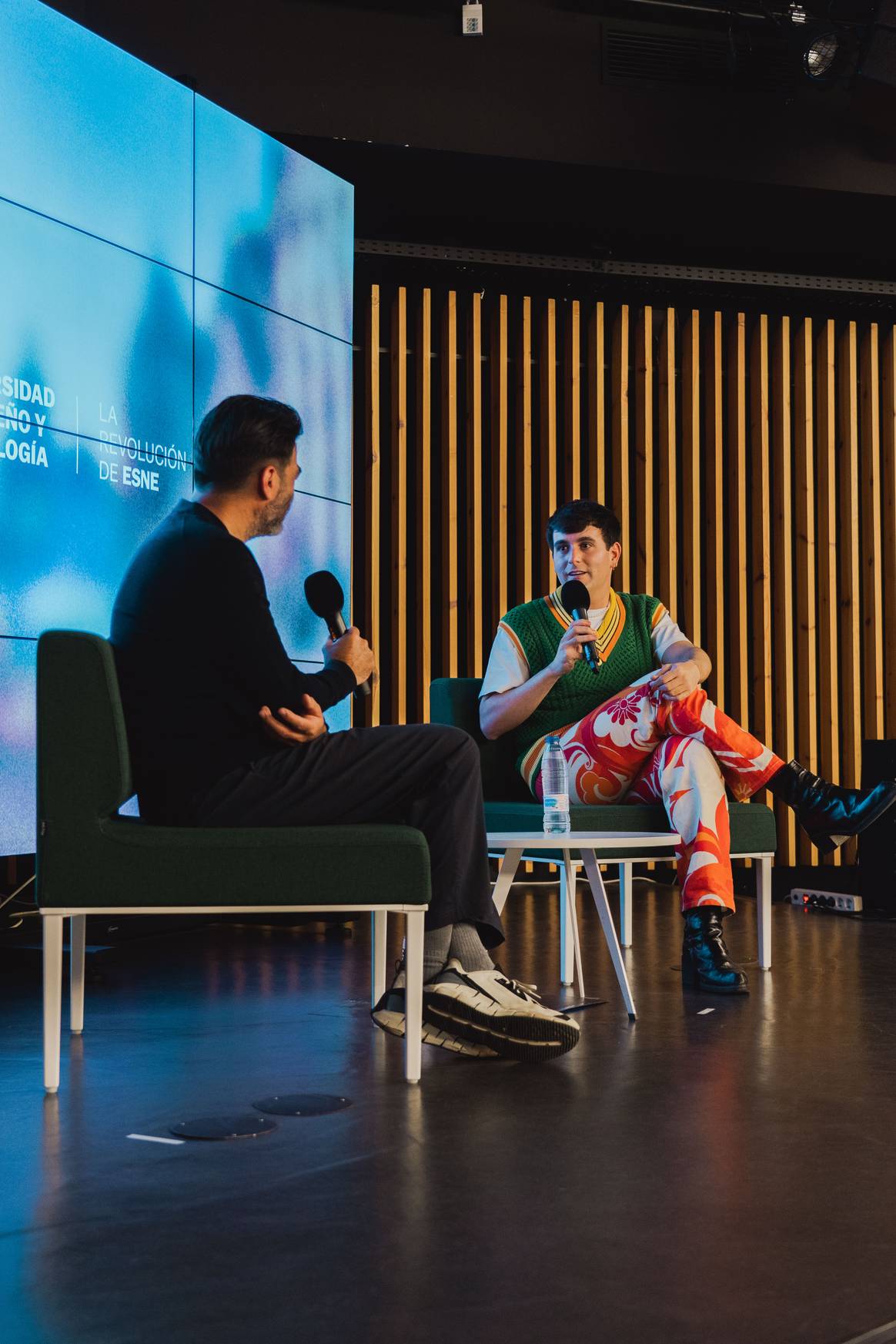 Spanish designer Alejandro Gómez Palomo (right) in conversation with fashion journalist Rafael Muñoz during the university's first Fashion Communication Week. Image courtesy of UDIT.