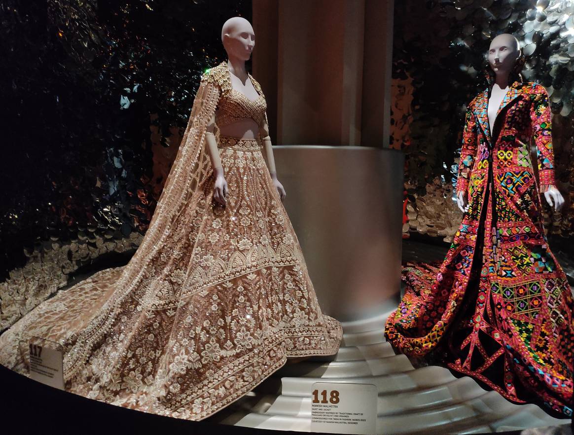 Richly embroidered dresses by Indian designer Manish Malhotra inspired by the traditional craft of Phulkari on velvet and organza, which were commissioned for the exhibition. Image: Sumit Suryawanshi for FashionUnited