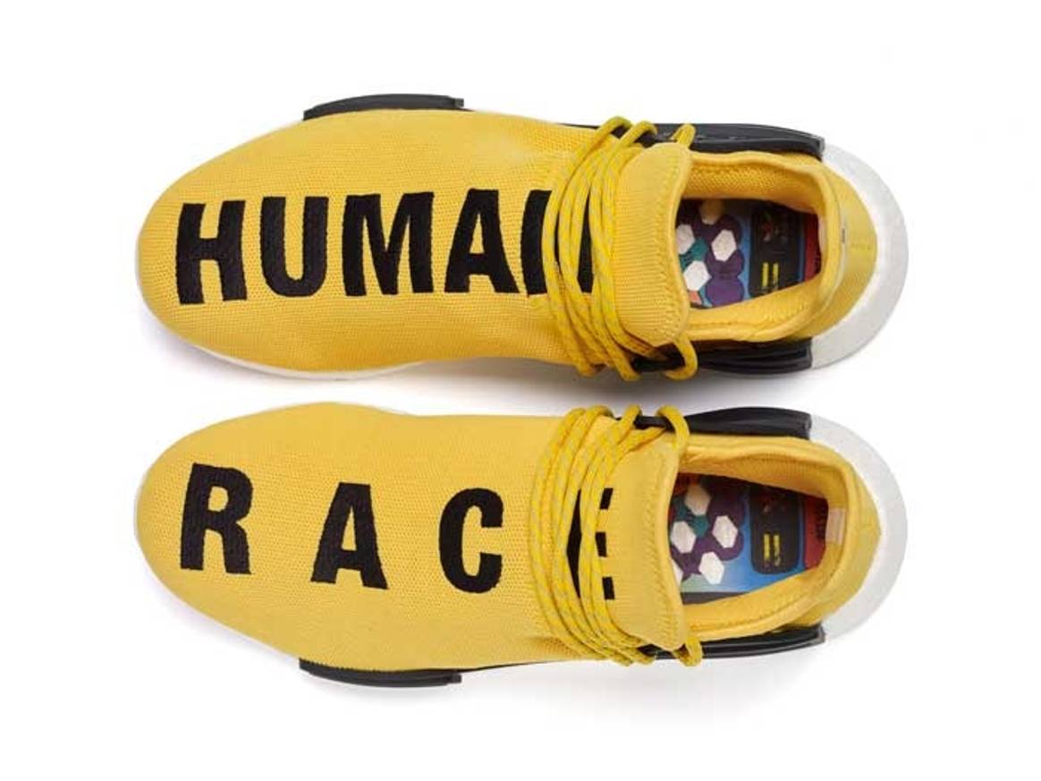 Un Las zapatillas deportivas Pharrell Williams Hu NMD para