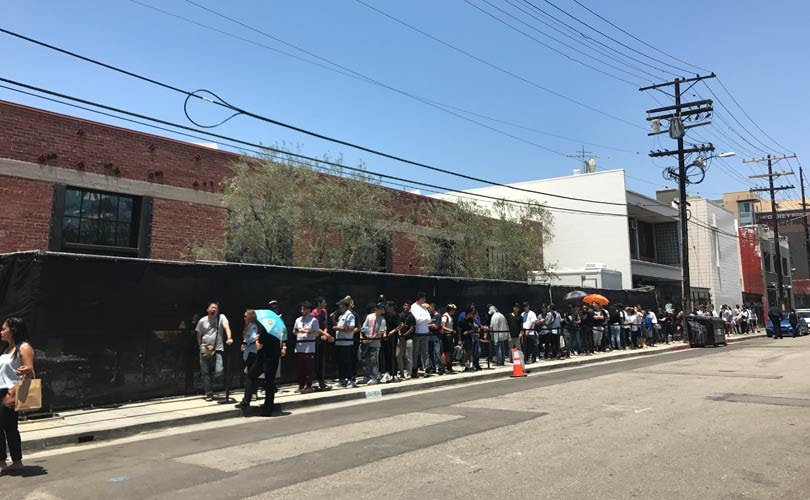 Louis Vuitton x Supreme pop-up shutters after LAPD scuffle