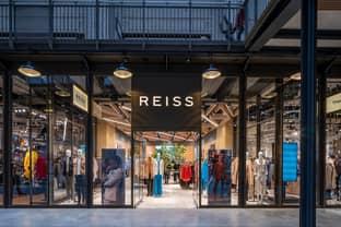 Next snaps up 34 percent interest in Reiss Group 