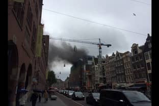 Grote brand in C&A-pand Damrak in Amsterdam