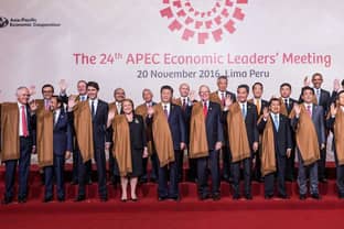 World leaders tone it down in Peru with shawls after baggy ponchos