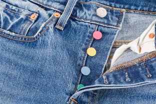 Gold, red and pastel-colored buttons garnish commemorative Levi’s 501