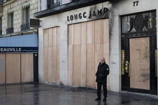 Luxury stores in Paris vandalized by violent protestors