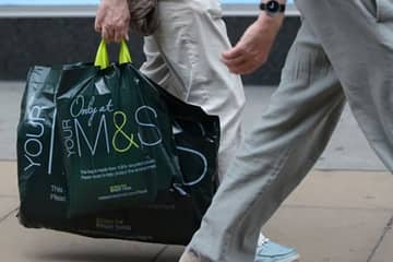 Retailer's plastic bag levy raises millions for charities