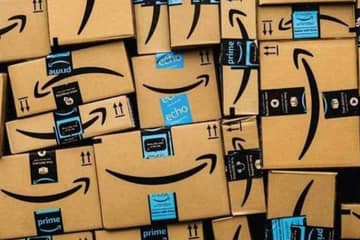 Amazon: utile dimezzato nel trimestre