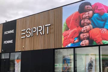 Esprit swings to H1 loss as sales fall