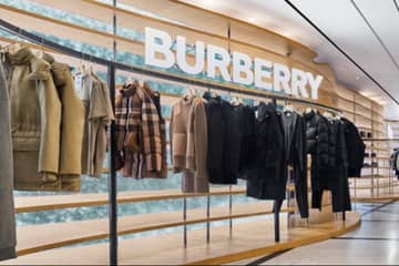 Burberry lowers full year outlook