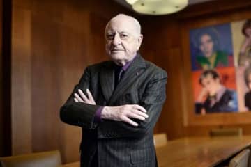 Fashion mogul's library set to raise millions for AIDS research