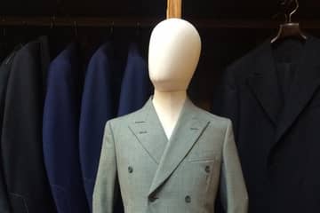 Huntsman for Alexander McQueen suit returns home