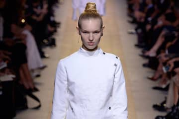 Chiuri raises banner of feminism in first Dior show