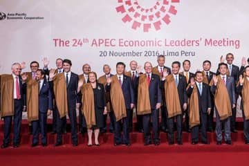 World leaders tone it down in Peru with shawls after baggy ponchos