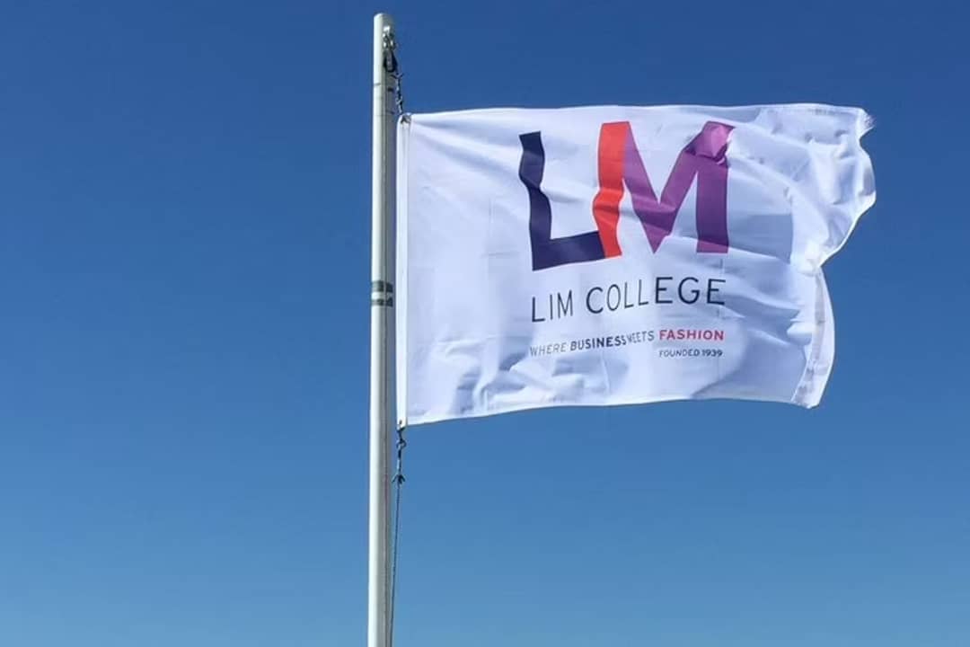 LIM College flag reading college slogan.