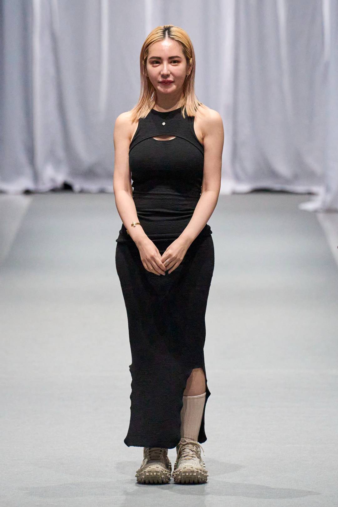 Designer Tzu Chin Shen at the finale of her SS24 show at Tokyo Fashion Week.