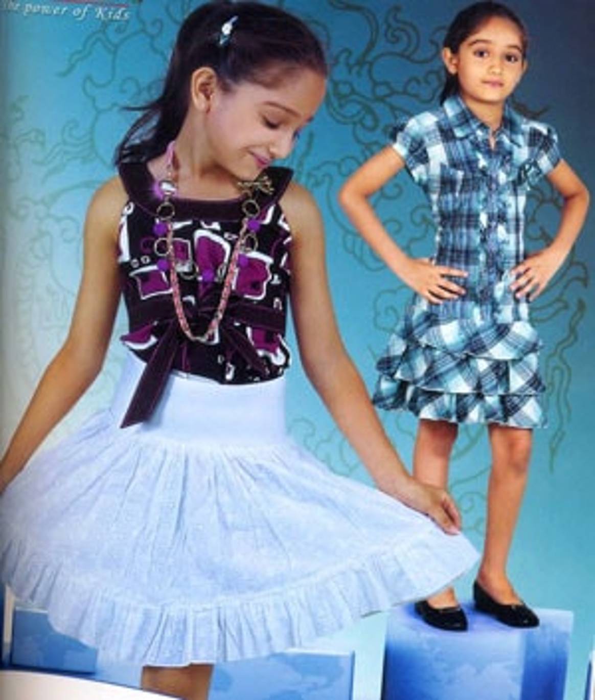 Power Clothing: Dressing up children with adult concepts