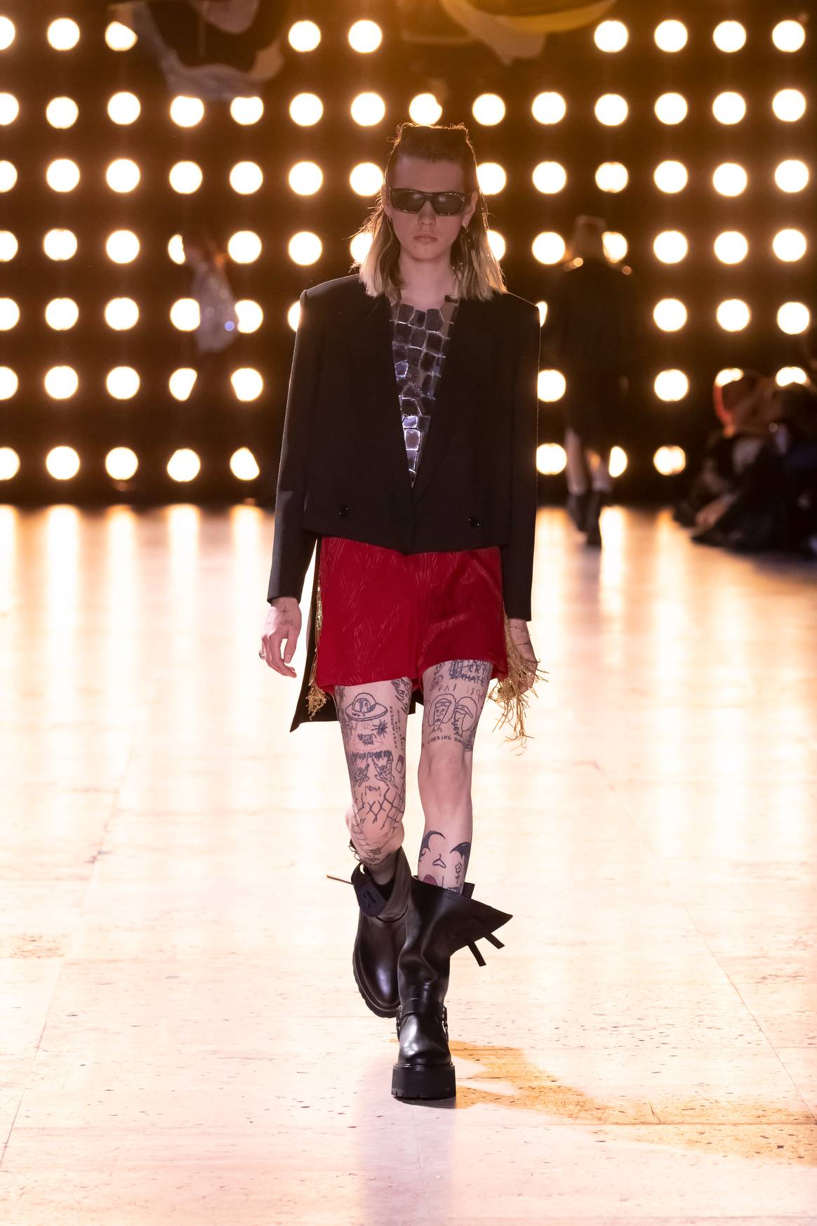Image: Sex, Drugs, Rock 'n' Roll and "Ignorant Style"-Tattoos at Celine Homme SS23. | Credit: Celine