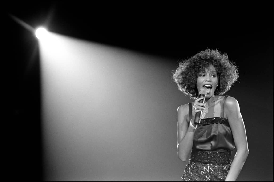 Image: V&A 'Diva'; Whitney Houston performing at Wembley Arena, London by David Corio