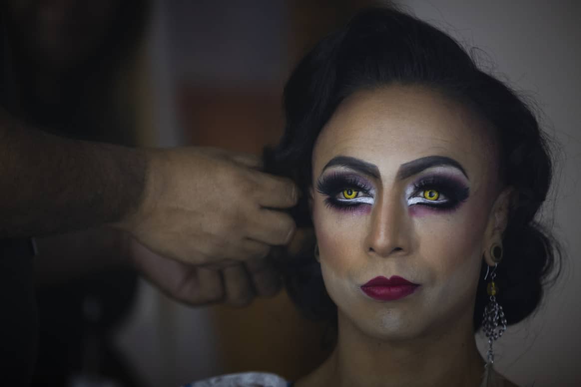 A model gets ready backstage at the Original Fashion Week at Complejo Cultural Los Pinos, Mexico City, November 2022. Photo: Rodrigo Oropeza / AFP.