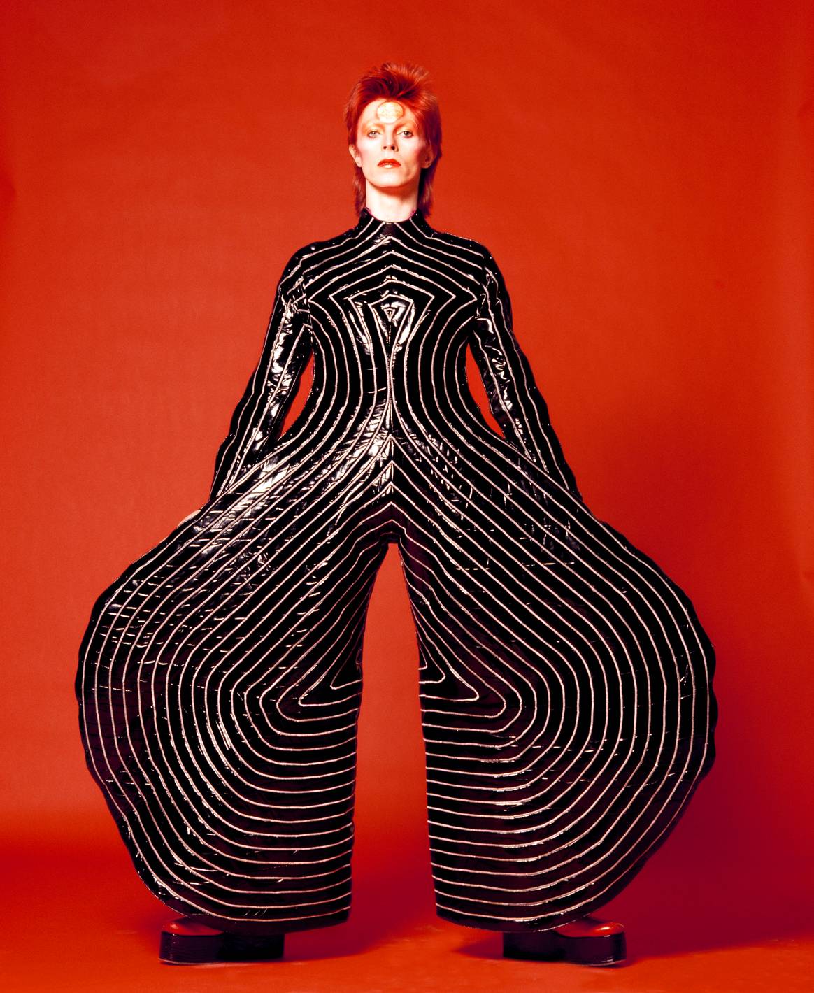 Striped bodysuit for Aladdin Sane tour, 1973 Design by Kansai Yamamoto Photograph by Masayoshi Sukita © Sukita The David Bowie Archive 2012. Image: V&A