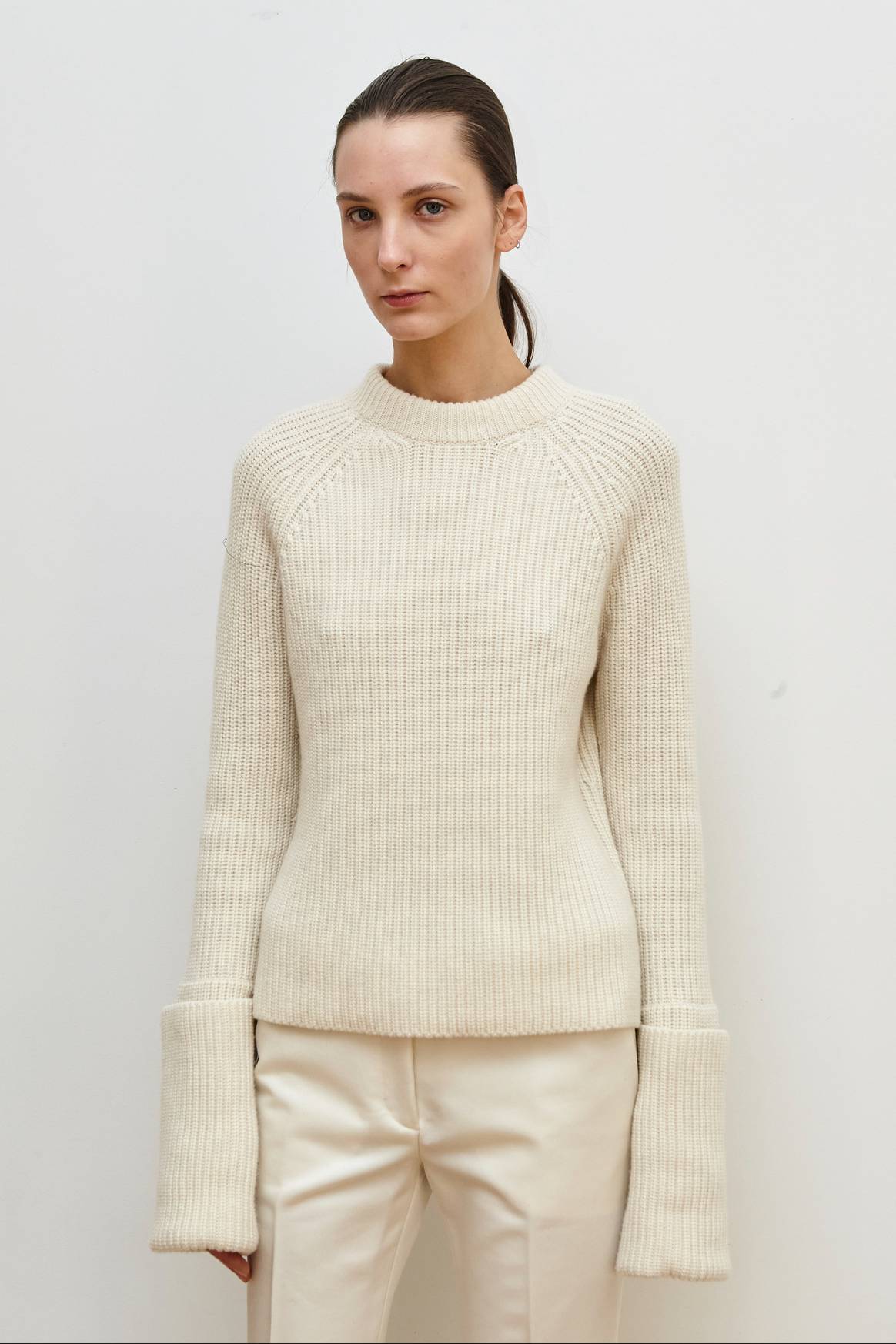 In this image, you can clearly see rows of v's at the front of the knitted fabric. Credit: image of Sa Su Phi, autumn/winter 2023 ready-to-wear collection, via Launchmetrics Spotlight.