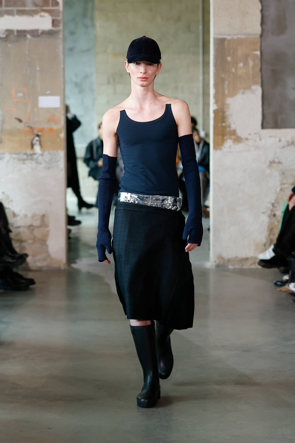 Duran Lantink presented during Paris Fashion Week, March 2023.
designing upcycled Hema shirts.