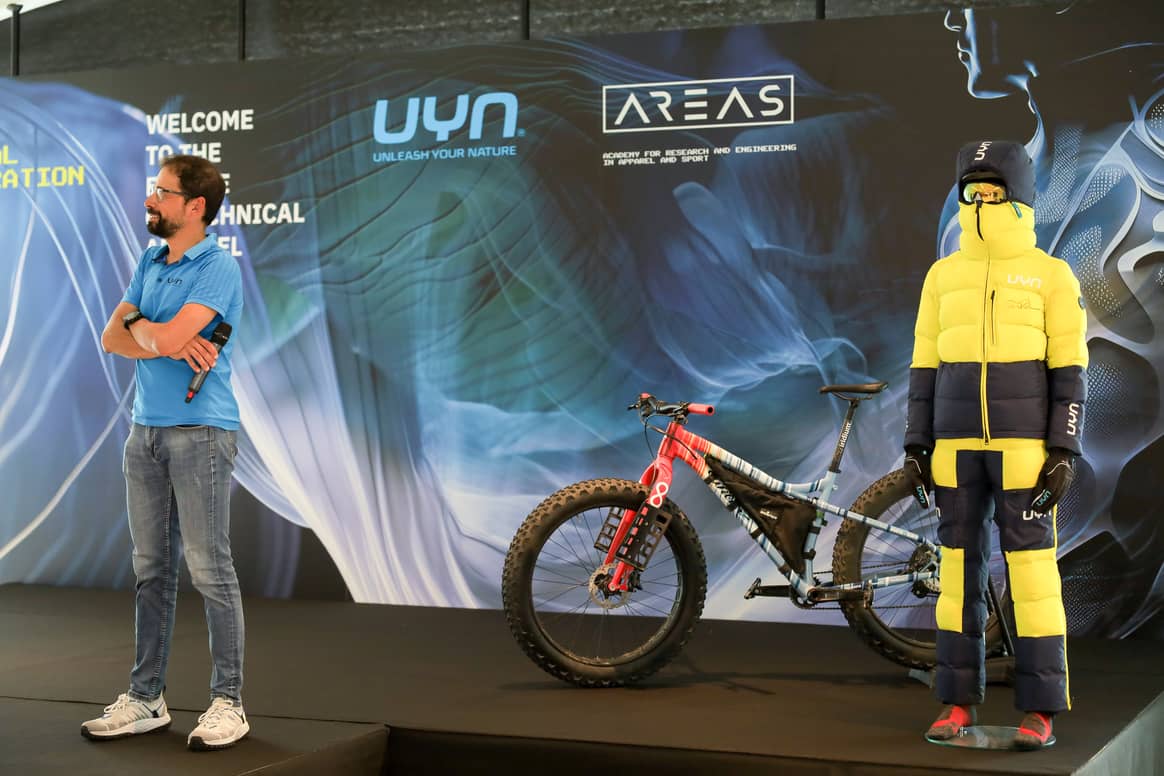 Omar Di Felice at the Areas opening ceremony with his bike and special UYN suit for Antarctica