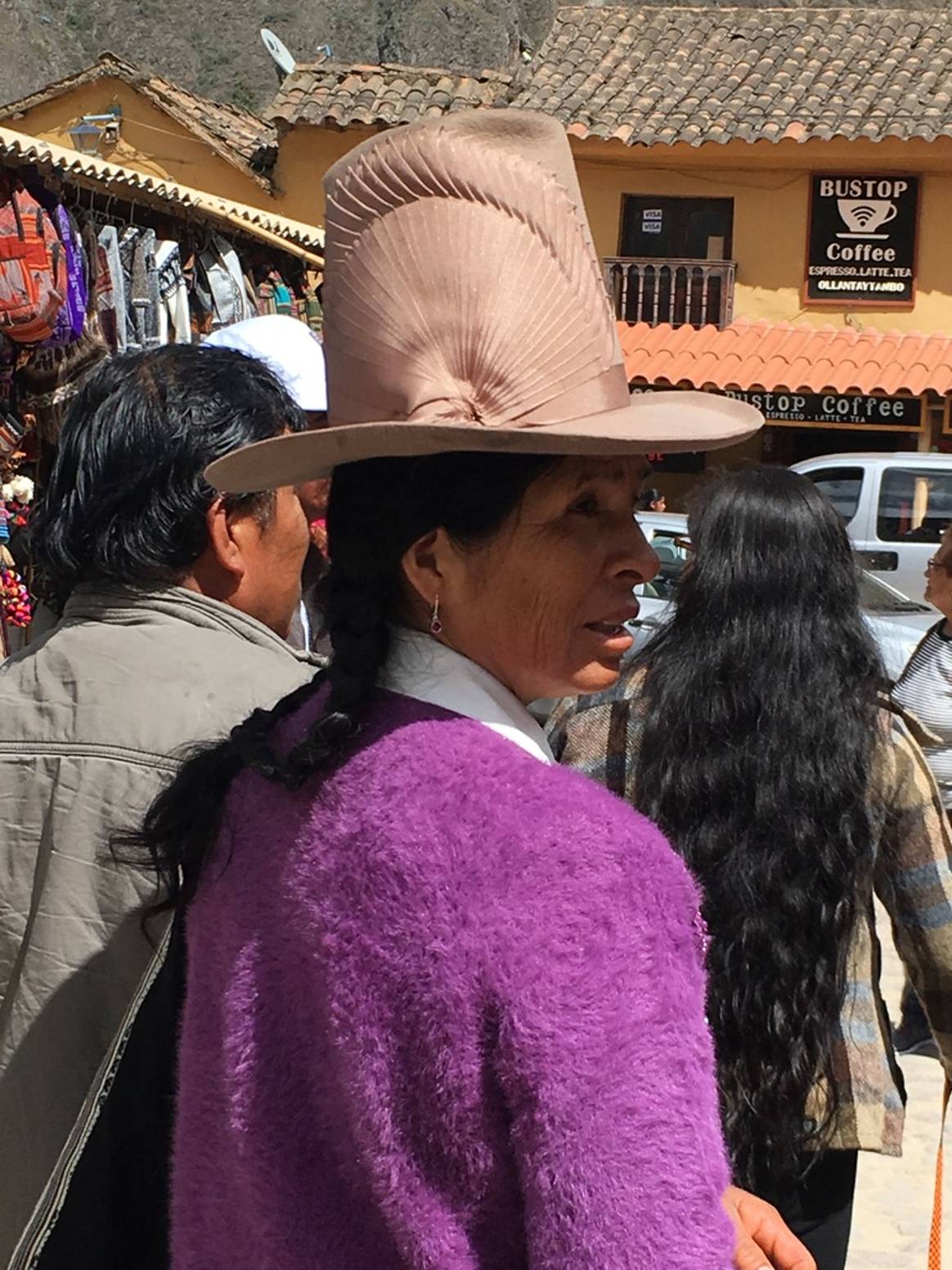 Eyecatching style of local woman in Ollantaytambo, Peru