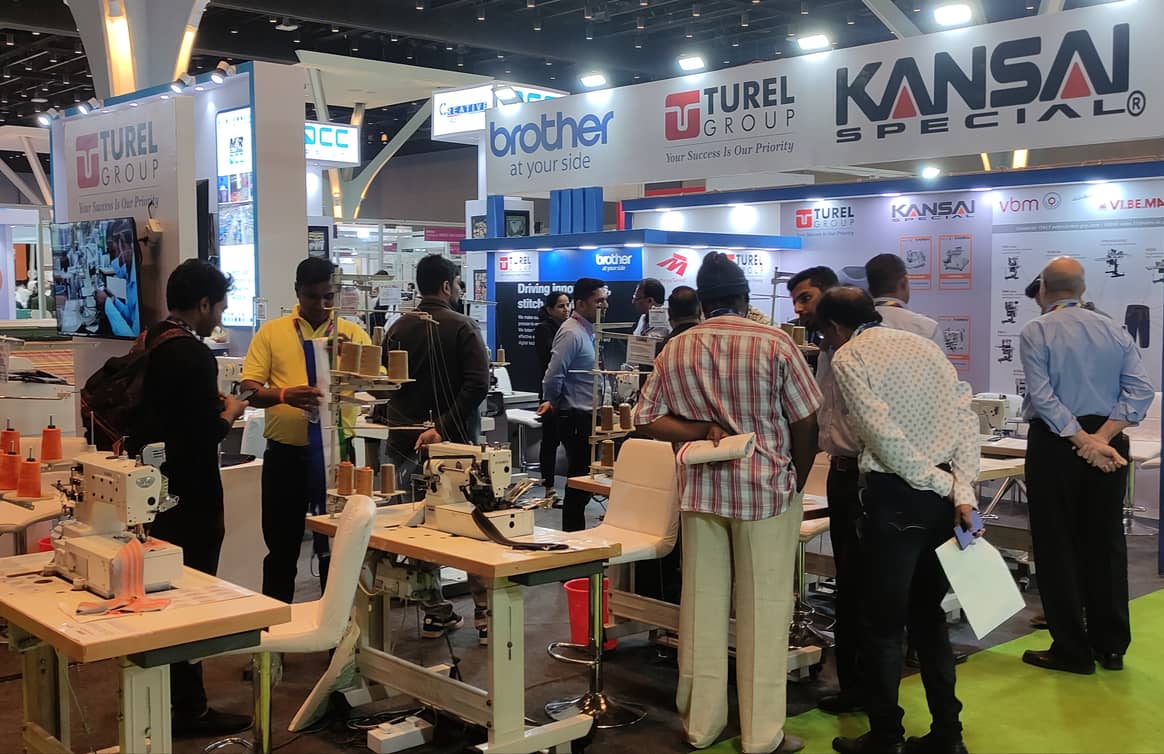 Sewing machines drew much interest, as seen at this distributor’s booth.