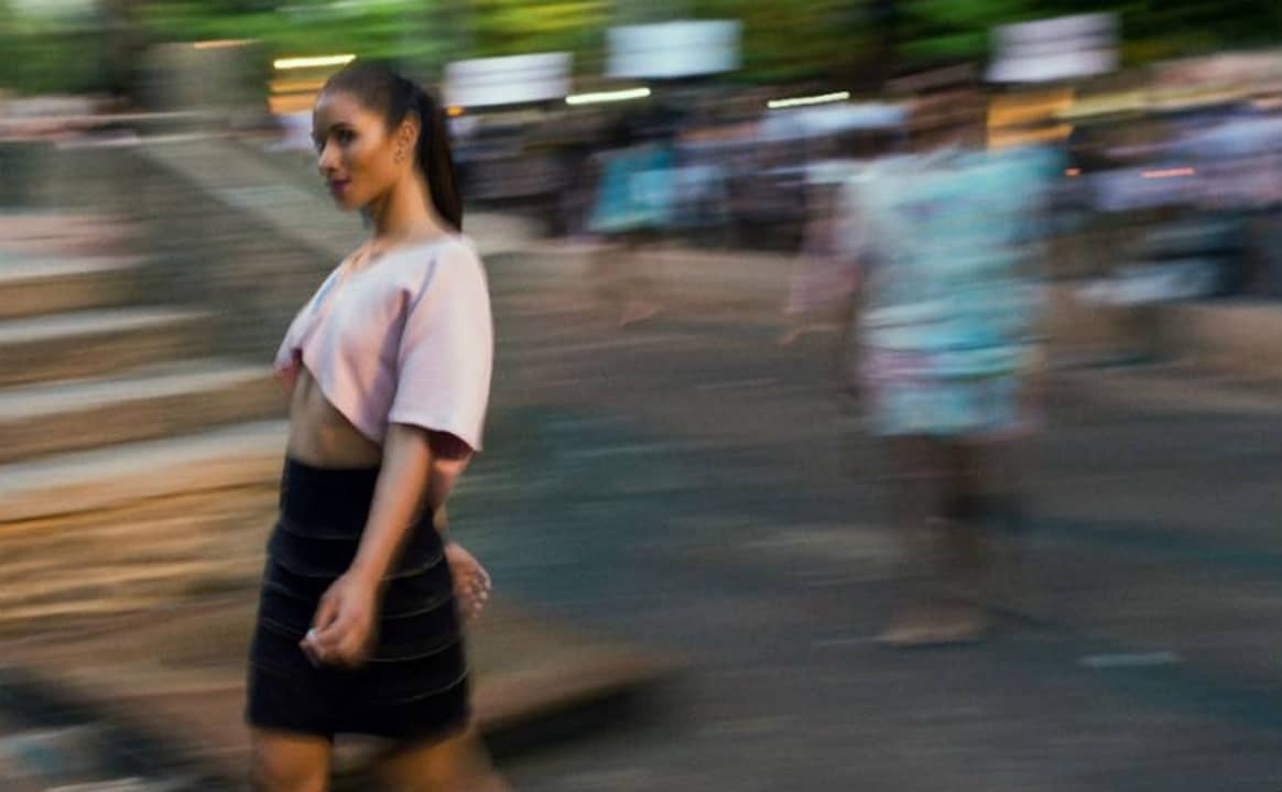 Models strut in Rio streets after fashion week fail