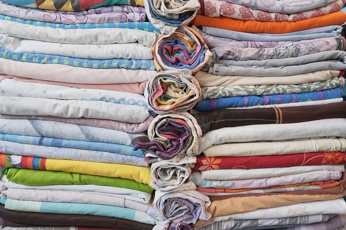 Texaid engagiert sich im Textilbündnis - Textilrecycling setzt verbindliche Nachhaltigkeitsziele