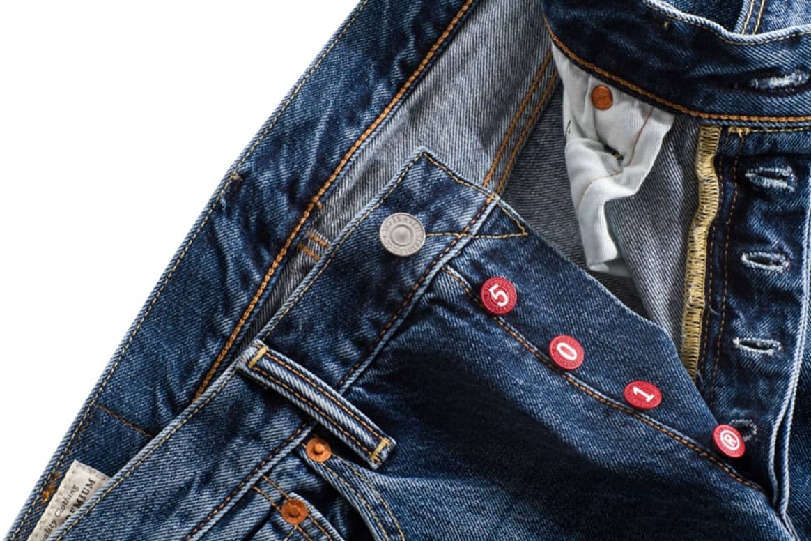Gold, red and pastel-colored buttons garnish commemorative Levi’s 501