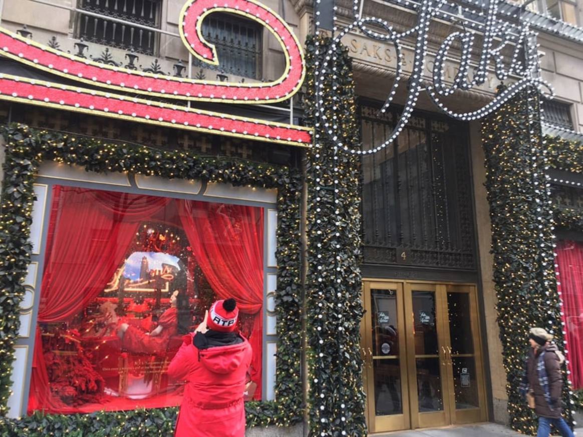 Behind those magical traffic-stopping holiday windows