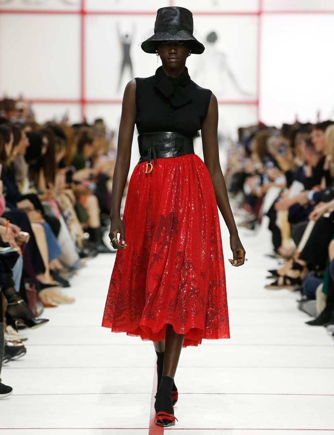 Tartan, hats and nipped waists: the big trends from Paris fashion week