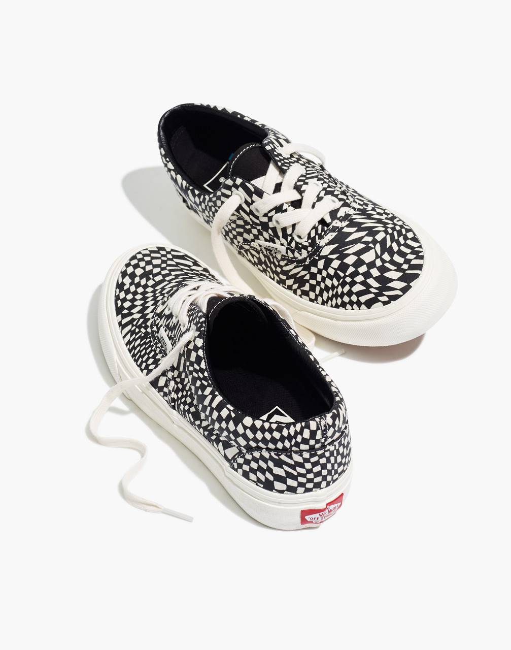 black and grey checkerboard vans lace up